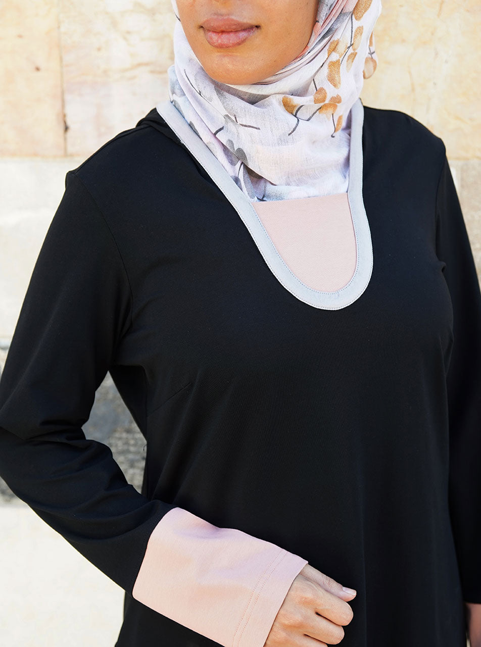 بلوزة رياضية بقبعة